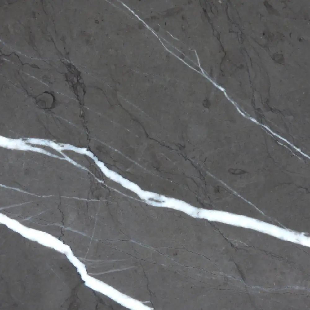 A colour way of Marble called Pietra Grigia, it is supplied by Complete Marble and Granite for SA Marble & Stone.